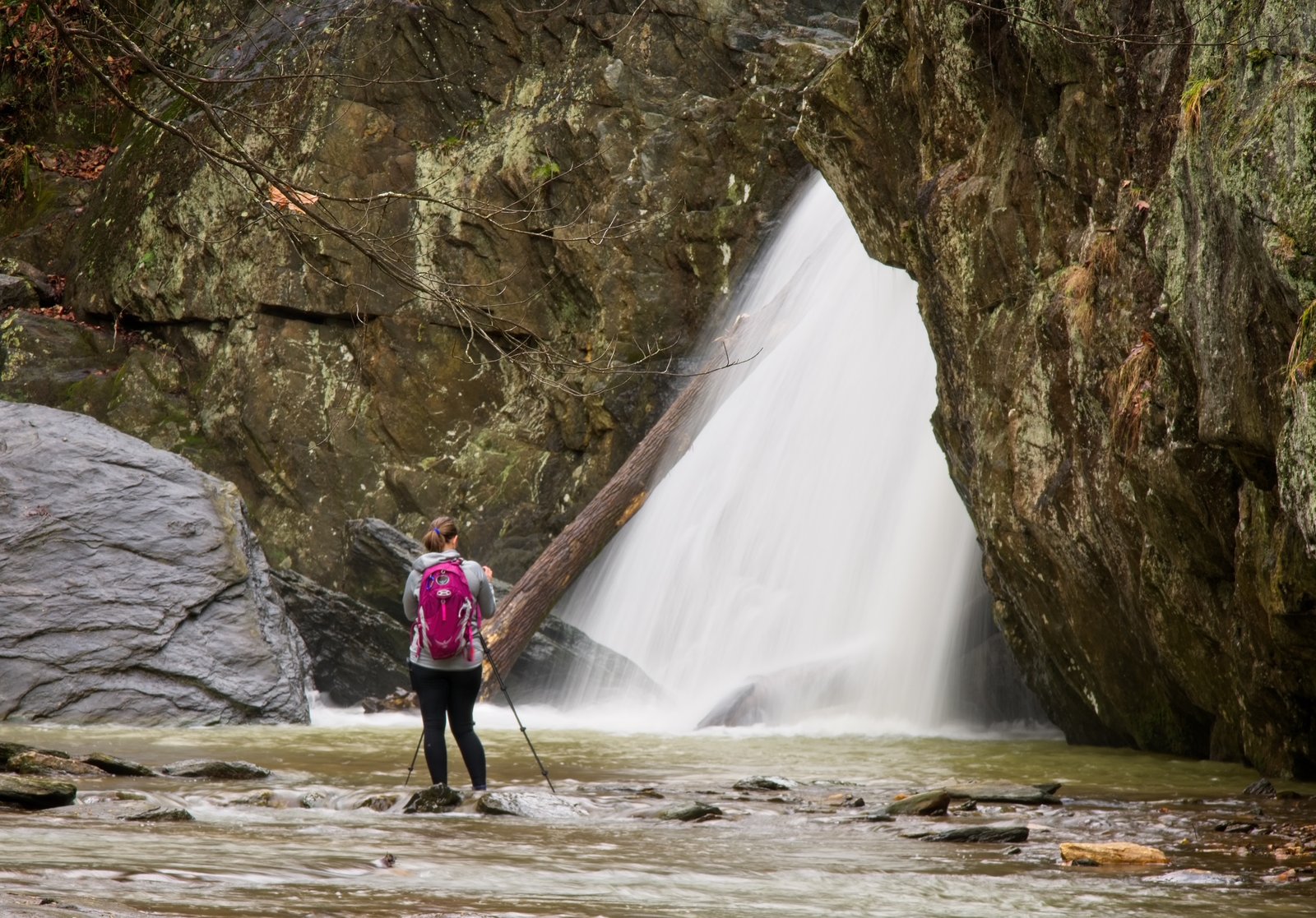 Jennifer Gonzalez Photography Instructor taking a picture of a waterfall